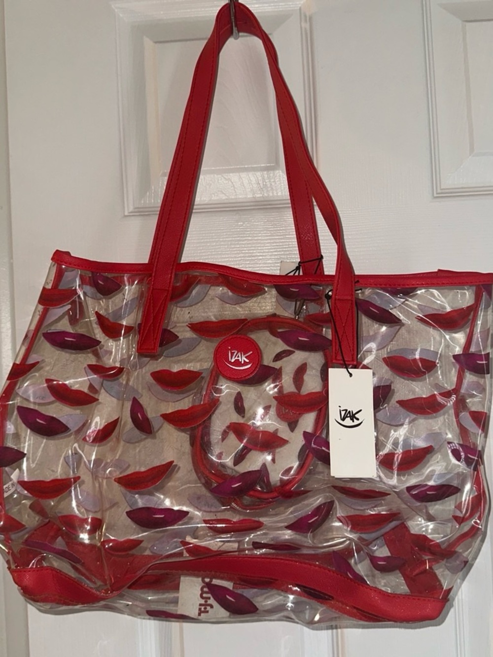 Izak clear tote bag with red lips patterned